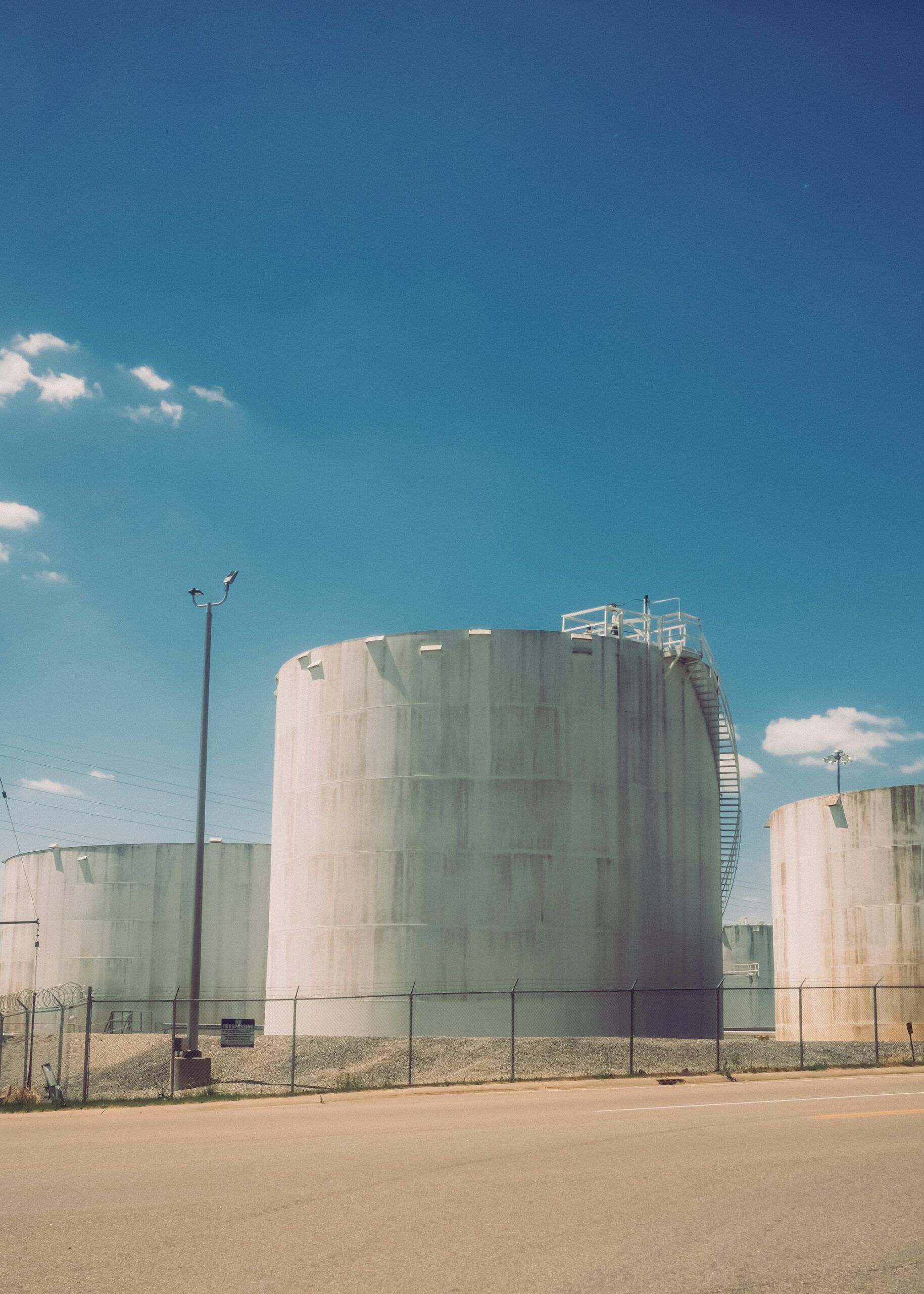 Metal storage tanks at an industrial facility — context photograph